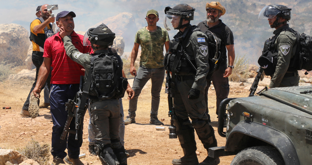Israeli forces arrest 14 Palestinians in West Bank raids