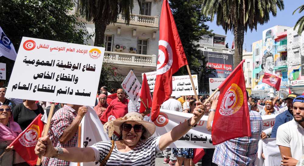Tunisia engulfed in crippling nationwide strike over economic woes as unions challenge president