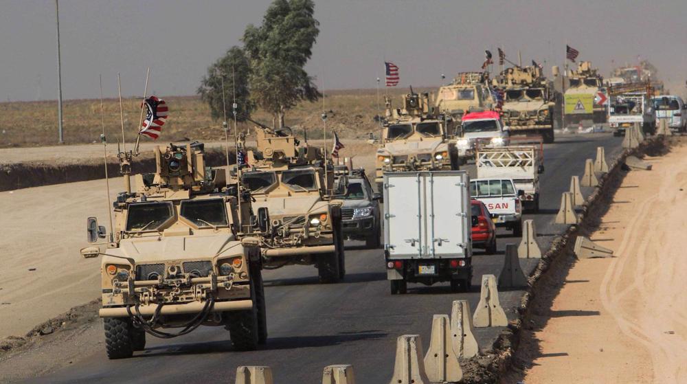 Large US military convoy crosses into Iraq with smuggled Syrian wheat