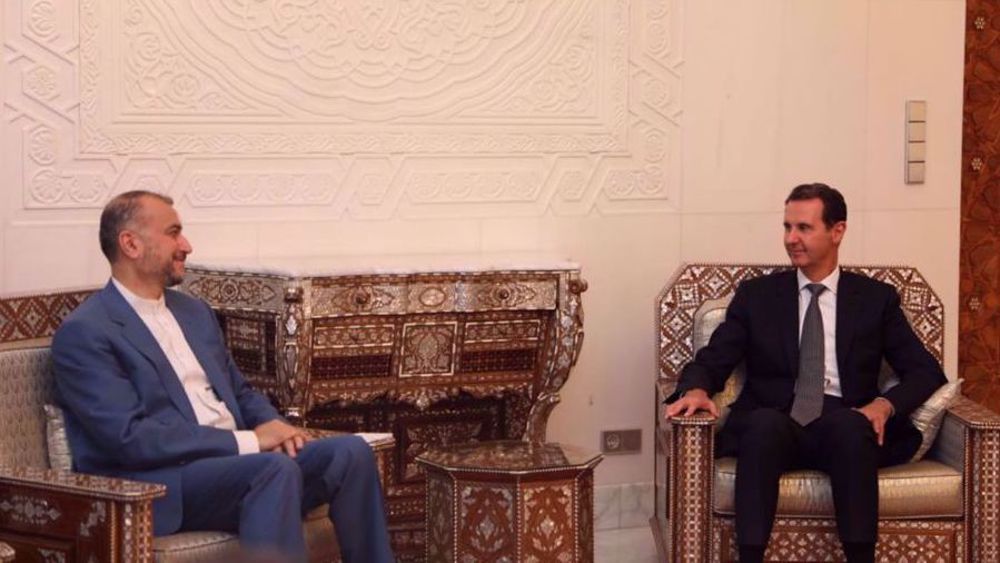 Iran’s FM visits Syria, meets President Assad