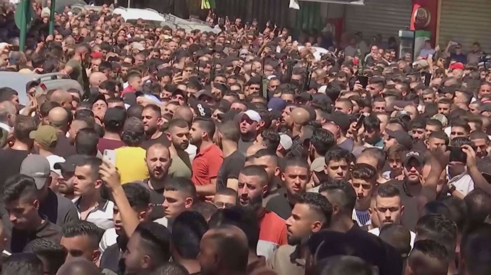 Thousands attend funeral for two Palestinian men killed in Israel's West Bank raid