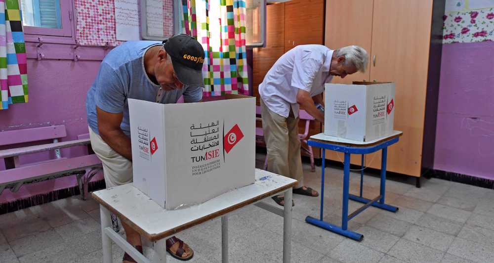 Tunisians vote in referendum on widely-bashed constitution