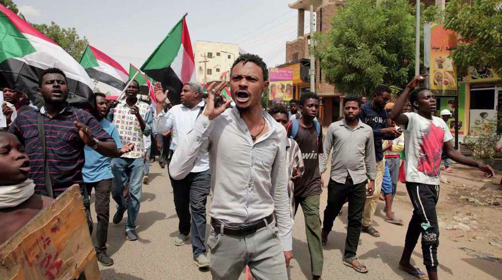 At least one killed in anti-coup protests in Sudan: Medical group