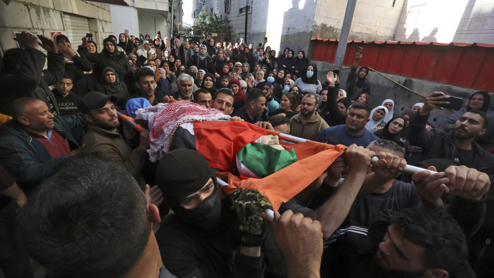 Palestinians mourn teenager shot dead by Israeli forces in West Bank 