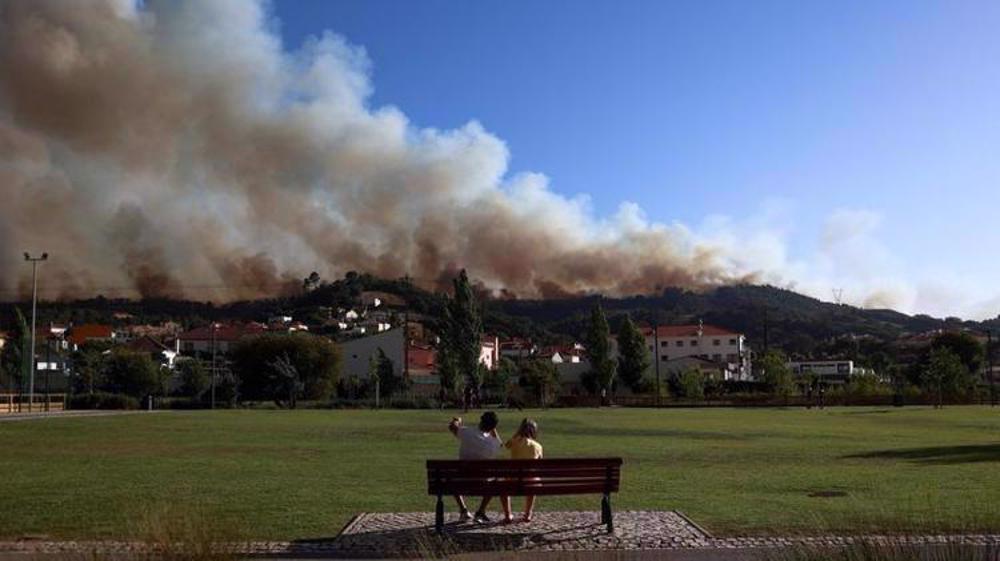 Firefighters battle new wildfires in Portugal, France as temperatures soar