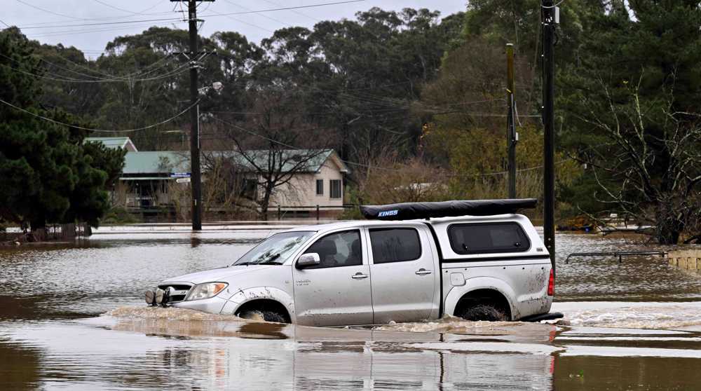 Tens of thousands told to evacuate as floods batter Australia's largest city