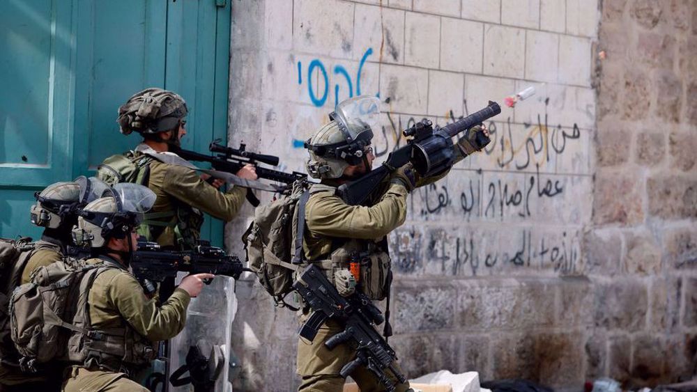 Clashes erupt after Israeli forces raid Palestinian district in East al-Quds