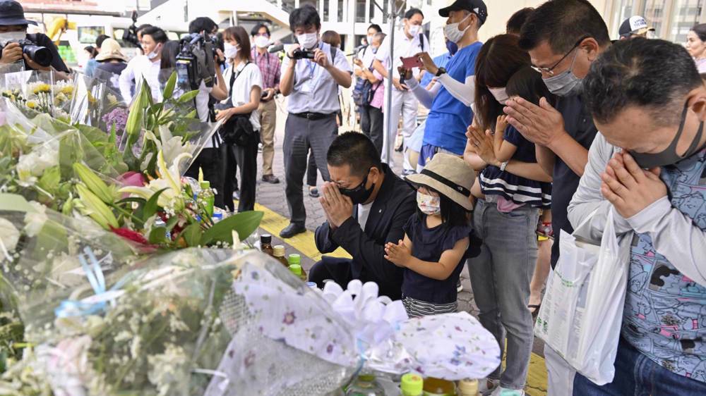 Japan mourns Abe's murder as questions swirl over motives