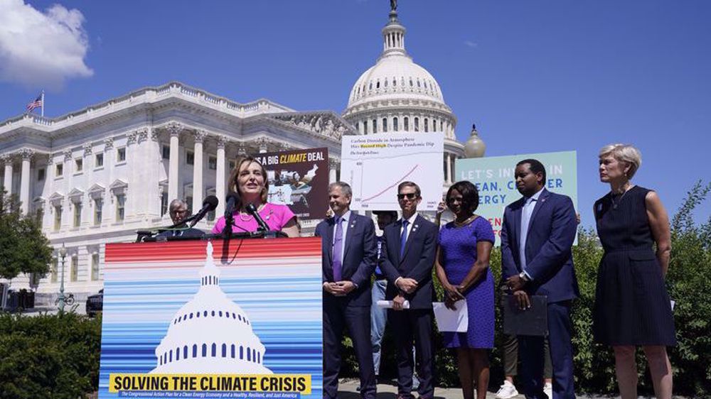 US lawmakers pass landmark climate, health plan