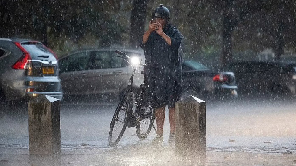 Millions of homes at risk of flooding in UK as heatwave subsides with thunderstorms