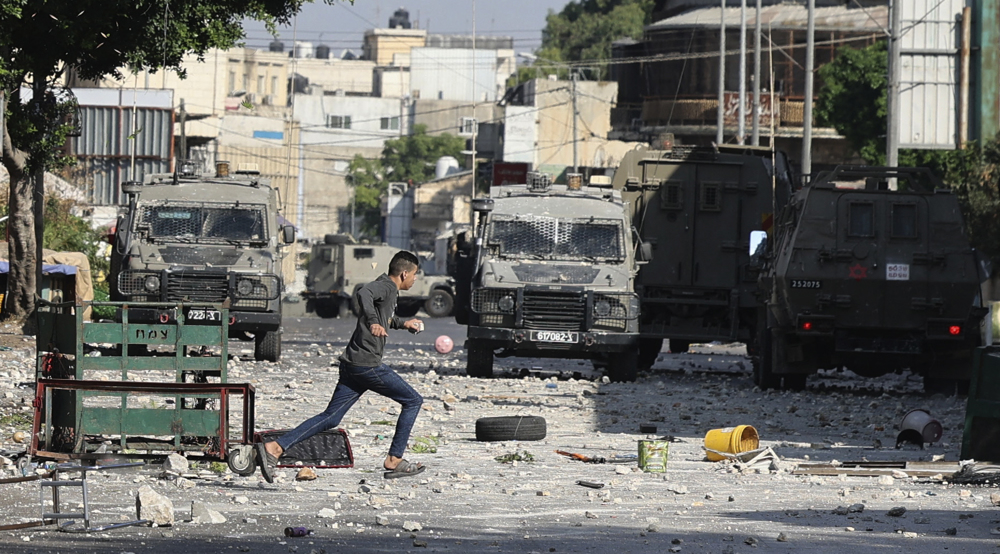Israeli military kills three Palestinians, injures scores in incursion in Nablus