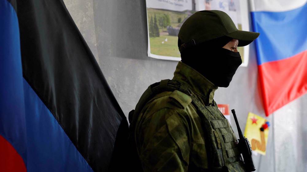 Kiev says recaptured territory in east as referendum polls begin