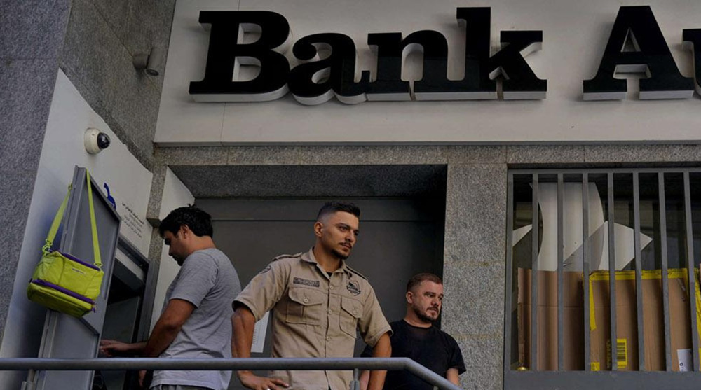 Lebanese banks reopen as protesters demand trapped savings