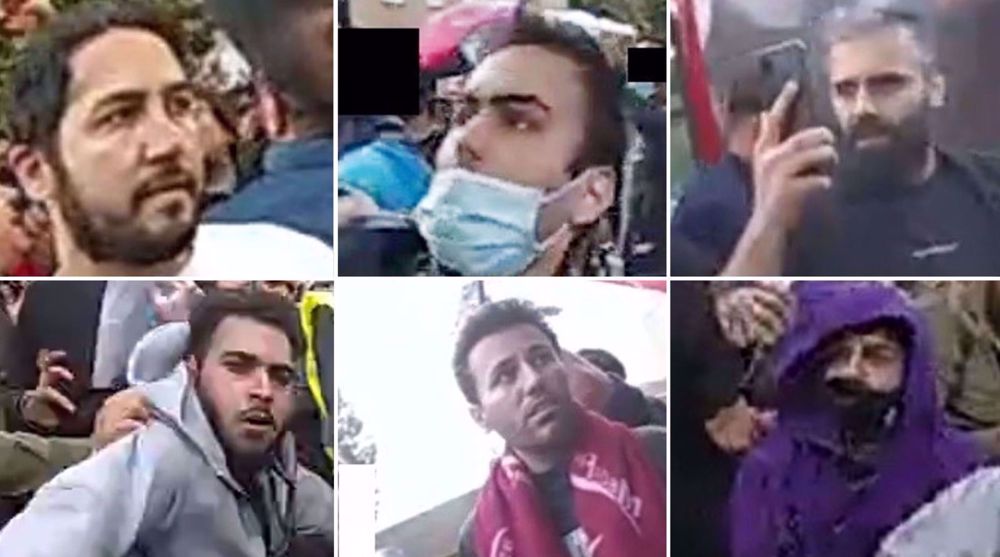 London police release images of 13 wanted people after riots outside Iran embassy