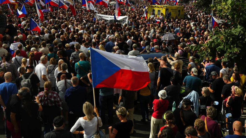 Tens of thousands take to streets in Prague in protest at Czech government's support for Ukraine