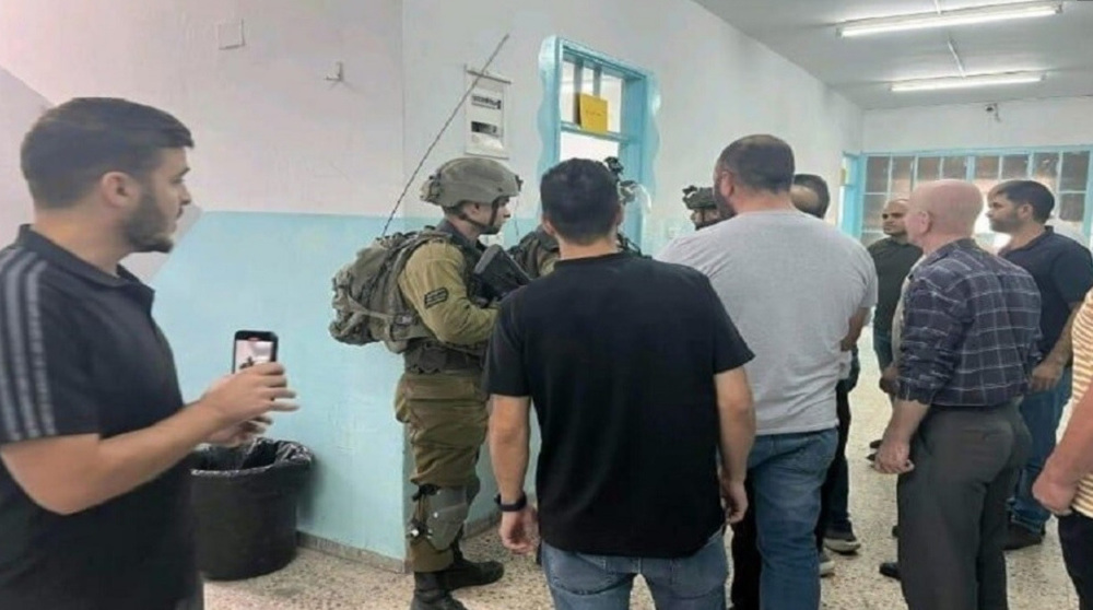 Israeli forces raid al-Khalil elementary school, attack teachers, students