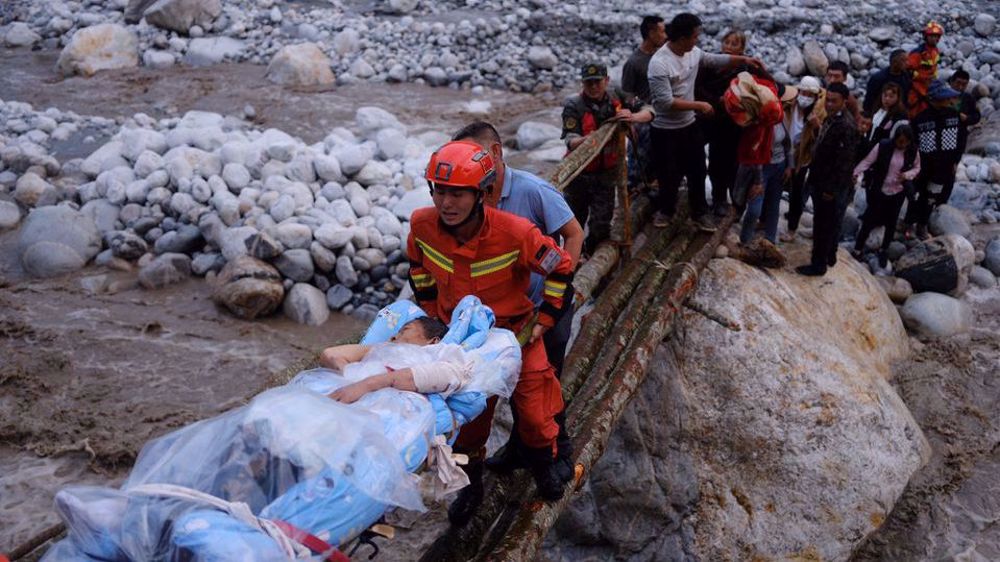 Death toll from China earthquake rises to 65 as rescue efforts continue