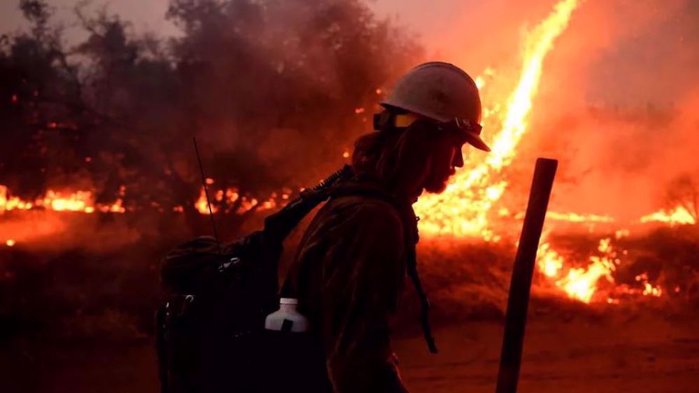 Raging wildfire in southern California triples in size, forcing evacuations