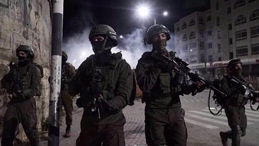 Israeli forces kill 2 Palestinians in raid on refugee camp in West Bank 