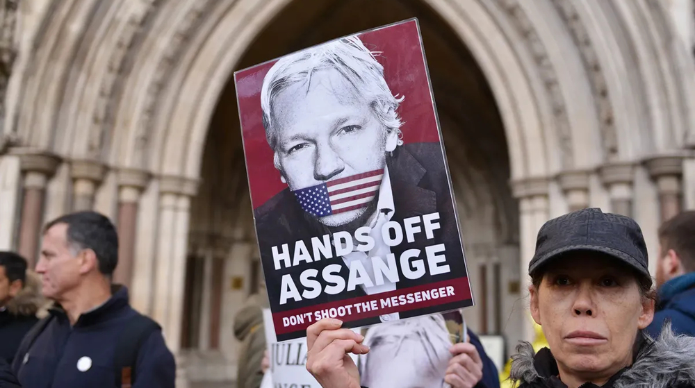 Biden accused of hypocrisy over seeking extradition of Julian Assange