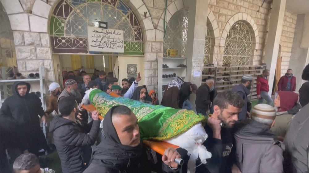 Palestinians hold funeral for young man killed by Israeli forces