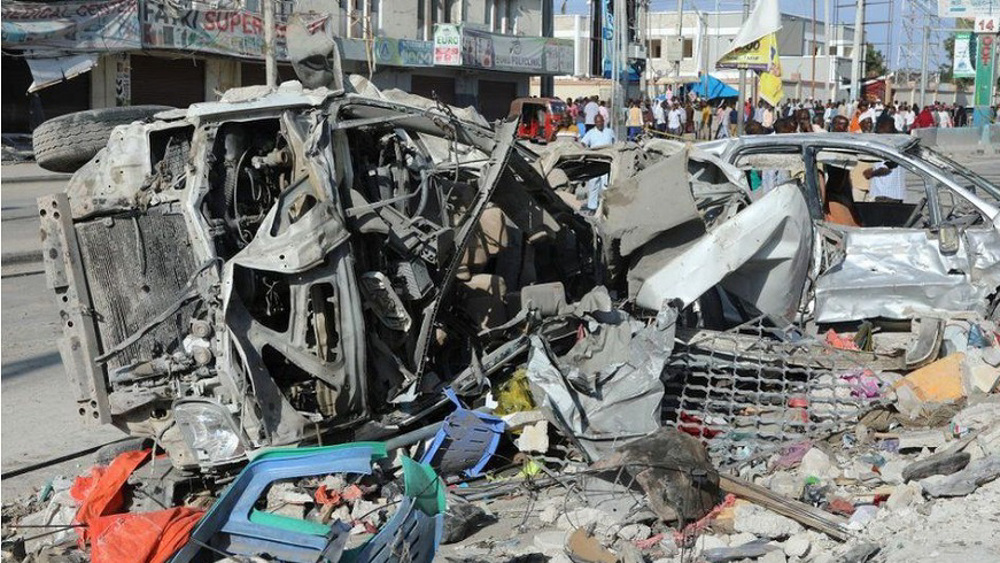 Death toll in Somalia twin car bombings claimed by Al-Shabaab rises to 35
