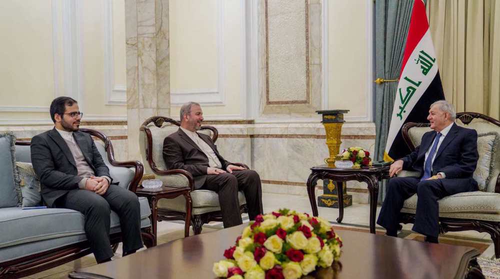 Iran envoy, Iraq president urge broader ties in all fields