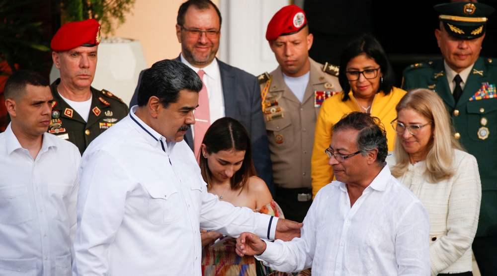 Colombian president in Venezuela, as two countries move to improve ties