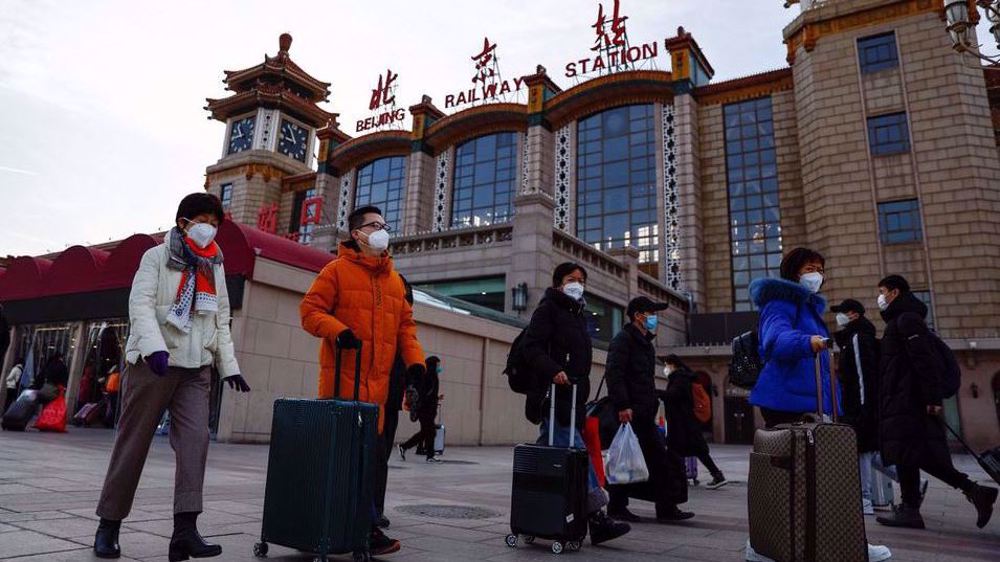 China scraps quarantine for overseas travelers