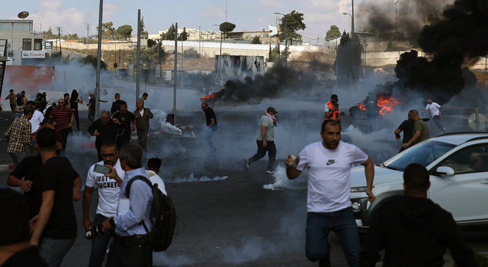 Israeli forces kill 16 in West Bank as Palestinians rally for Gaza 