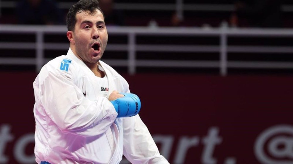 Iranian karate fighter Ganjzadeh scoops gold in Asian Games