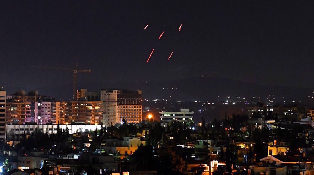 Israeli warplanes hit positions in Syria following rocket attack