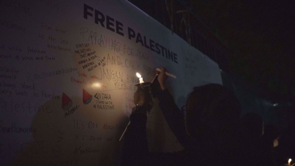 Indonesians hold candlelight vigil for peace in Gaza