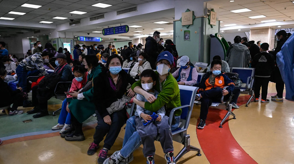 Crowds pack China's Beijing hospital after respiratory illness surge