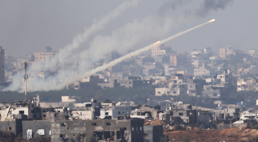 Caption: This picture shows a rocket being fired from inside Gaza towards the Israeli-occupied terri