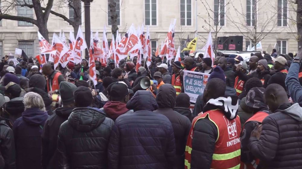 Migrants, refugees protest in Paris against controversial immigration bill
