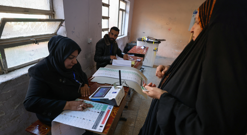 Historic vote: Iraqis go to polls in first provincial elections in a decade
