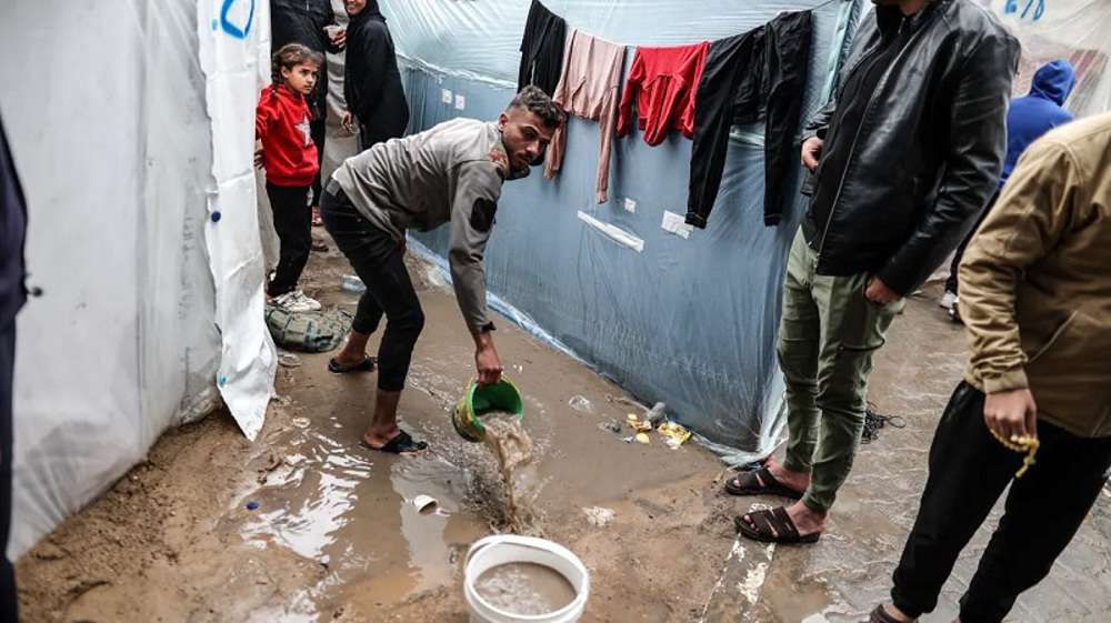 Displaced Palestinians face heavy rains