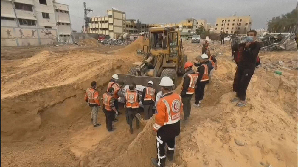 Mass burial in Gaza's Jabalia as rescuers recover dozens of bodies