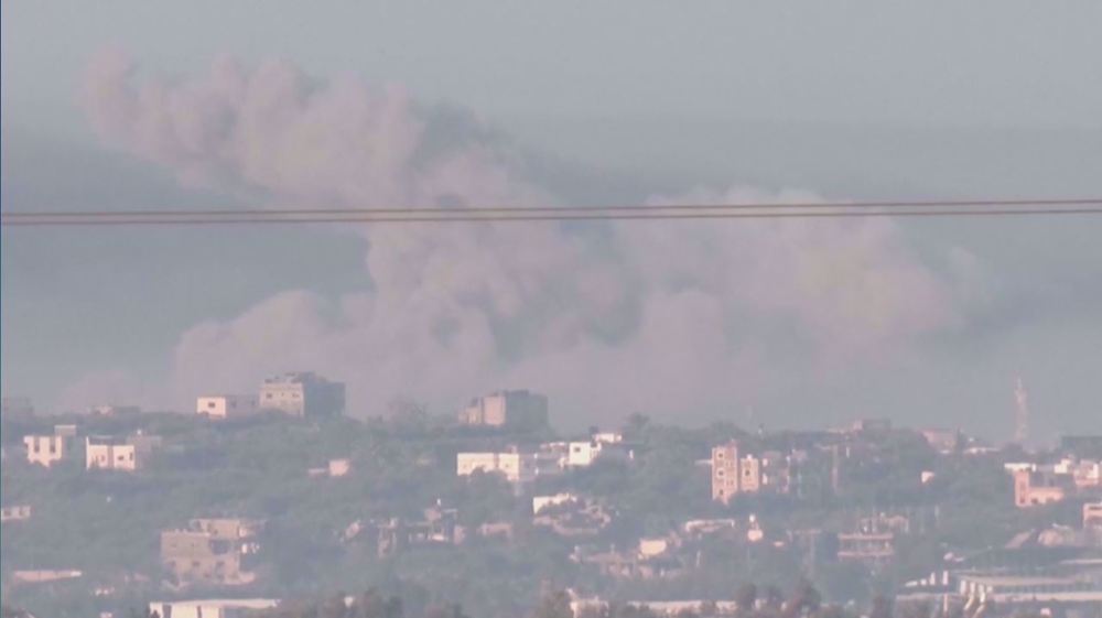 Heavy dark smoke rises over Gaza as Israel ramps up attacks 