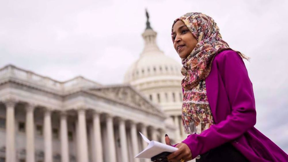 US Rep. Ilhan Omar (D-MN) (L) talks with Speaker of the House Nancy Pelosi (D-CA) during a rally with fellow Democrats before voting on H.R. 1, or the People Act, on the East Steps of the US Capitol on March 08, 2019 in Washington, DC. (AFP photo) 