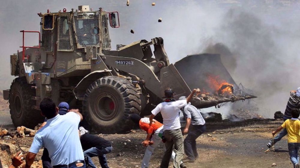 Qods: les Palestiniens bloquent l'entrée des bulldozers israéliens