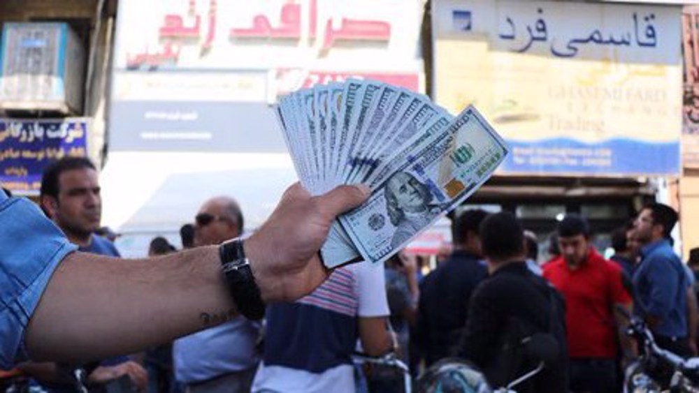 Iran opens new exchange center as rial hits record low