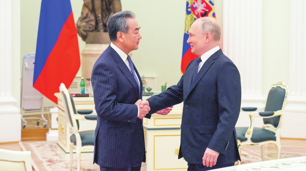 Putin, China’s top diplomat vow to bolster cooperation for ‘multipolar’ world