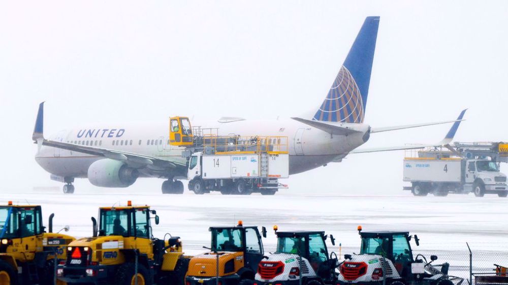 Massive snowstorm grounds 1,500 flights, knocks out power in US 