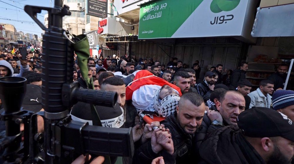 Thousands mourn 11 Palestinians killed in Israeli raid on West Bank city of Nablus