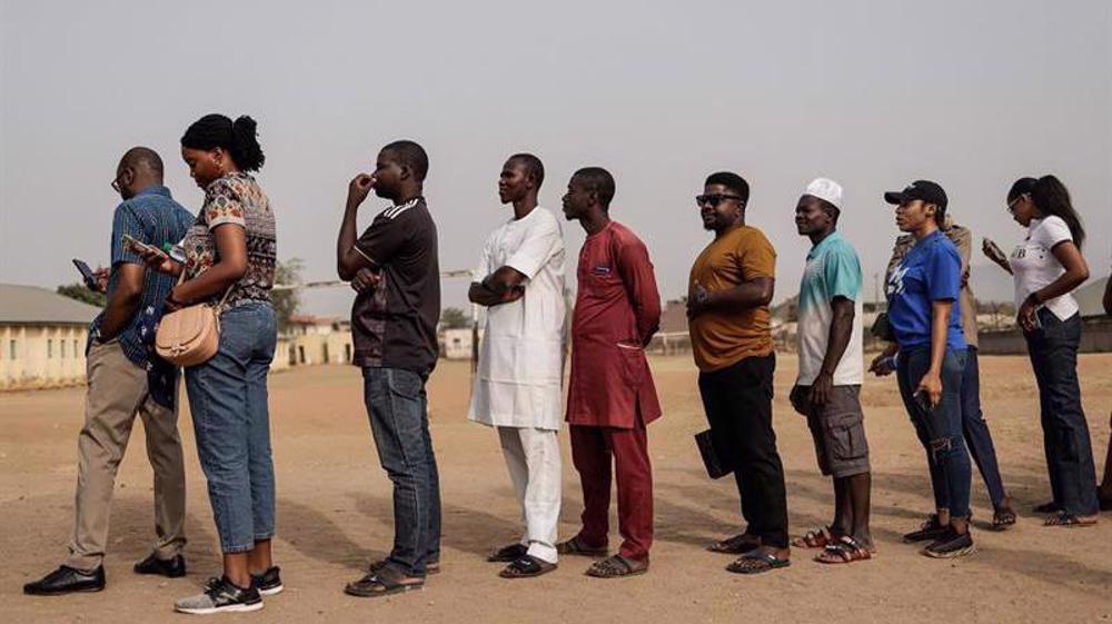 Nigerians vote in tight race to choose successor to President Buhari