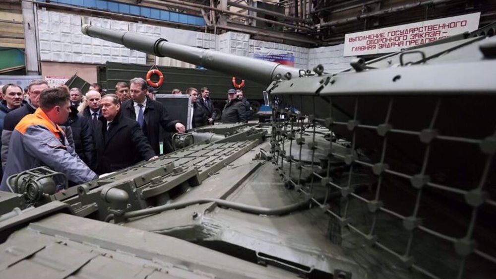 Russia's defense factories work round the clock to meet demand: Medvedev 