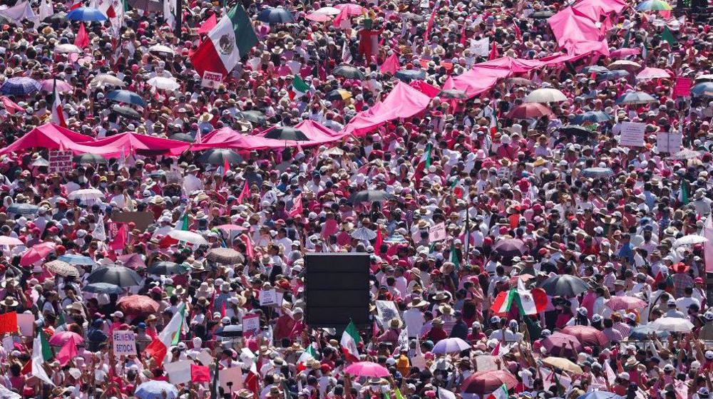 Thousands of Mexicans rally against electoral overhaul plan, say it threatens democracy