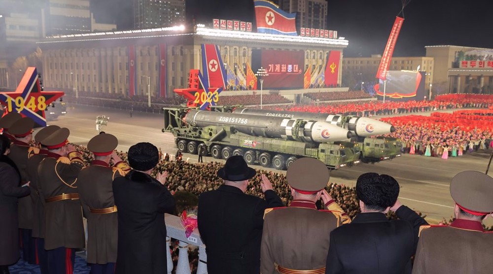 North Korea shows off advanced ICBM at nighttime military parade